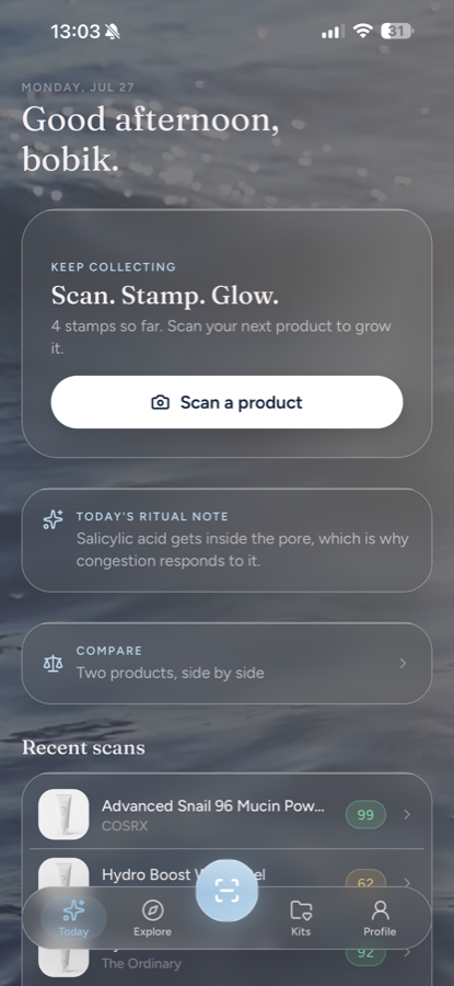 The SkinPassport home screen: an evening greeting, a card inviting you to scan your first product, a ritual note and a compare shortcut.
